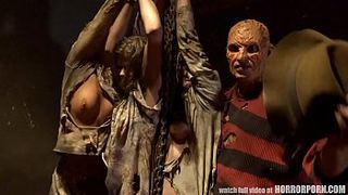 Фредди Крюгер мучает в подвале связанных тёлок и насилует одну из них на столе